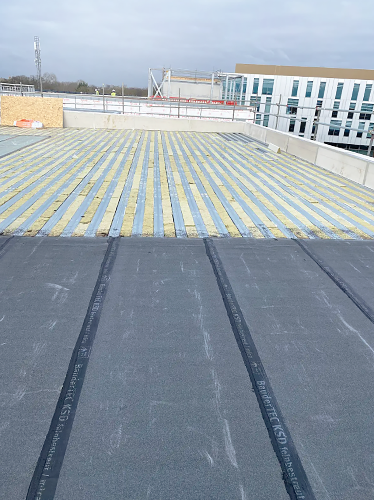 Installing non-combustible roofing systems for fire-safe flat roofs - Elliotts Premier Roofing