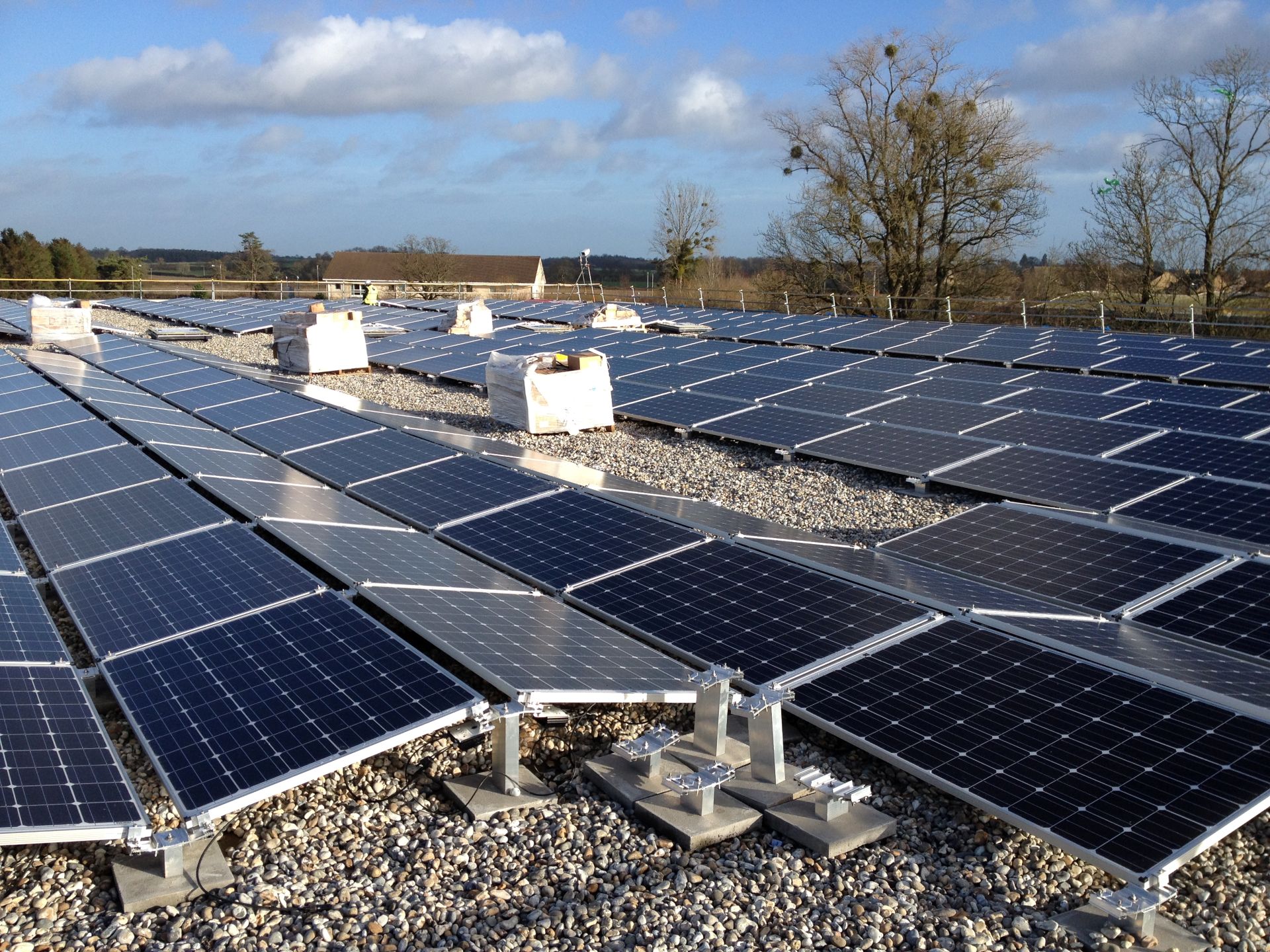 Close up on solar panels installed for Highwood Construction - photovoltaic installation - Elliotts Premier Roofing